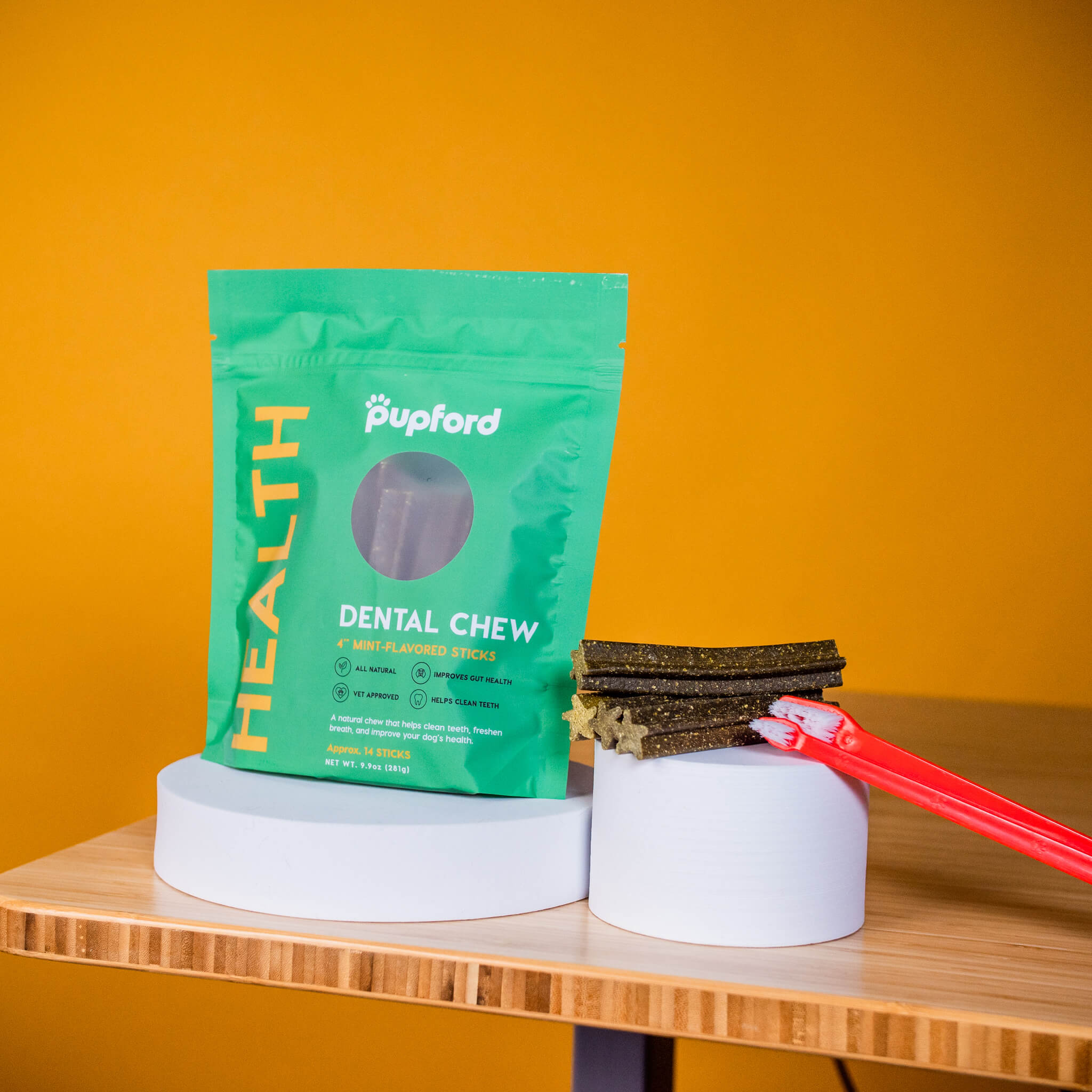 dental chews next to a toothbrush | Pupford