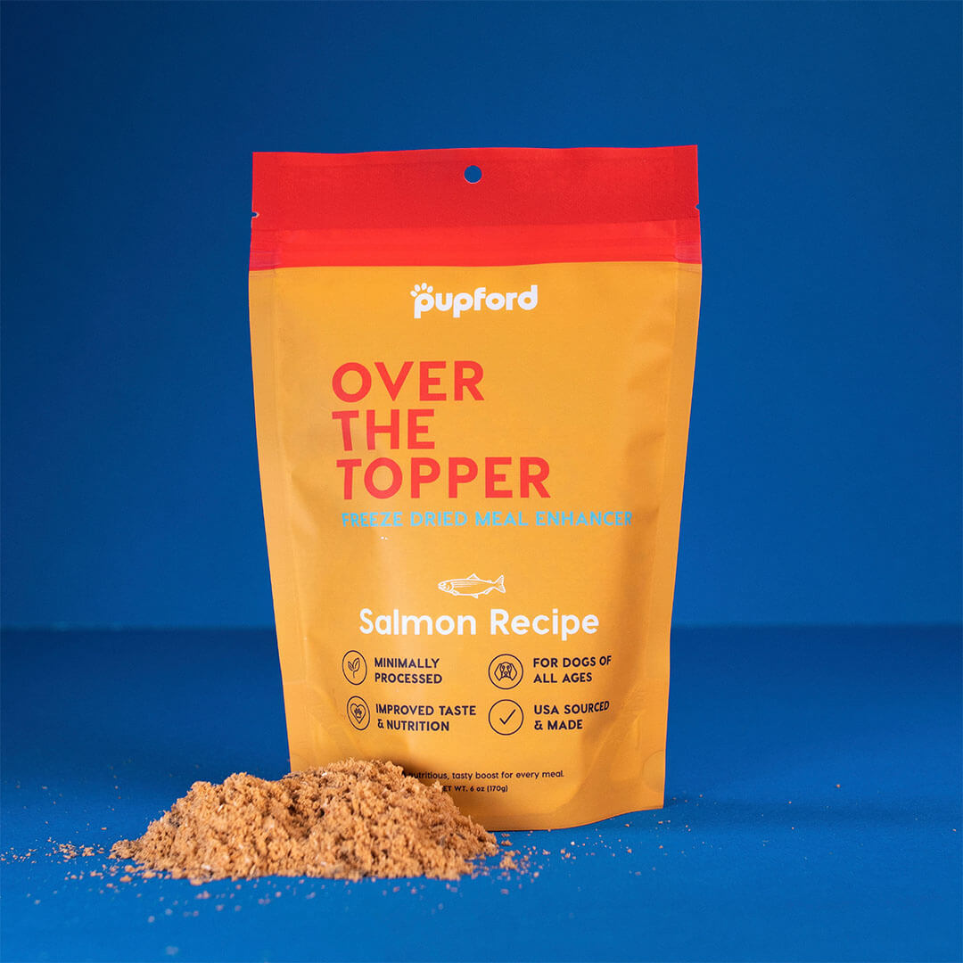 salmon meal topper in front of bag | Pupford